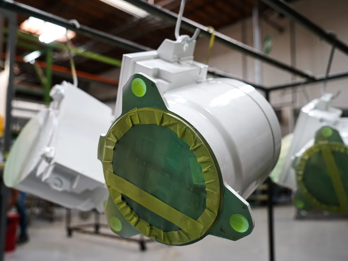 Parts with complex masking hanging on the line