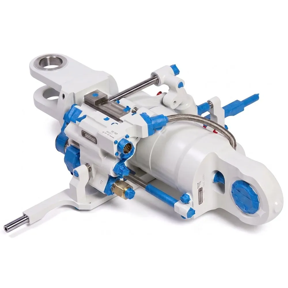 Finished flight control actuator in white and blue coatings