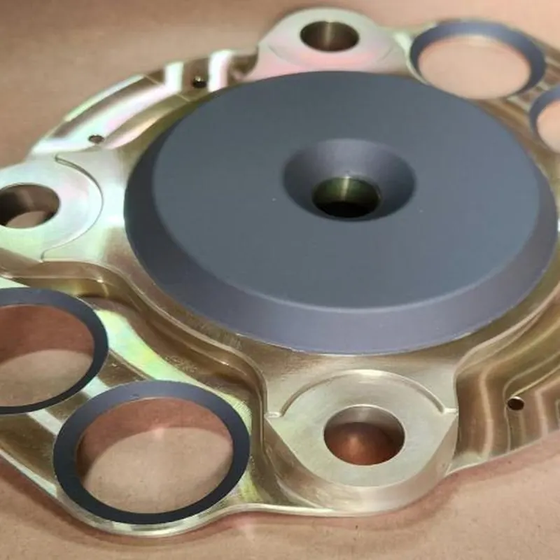 Actuator housing with chemical film, complex masking and dry film lubricant